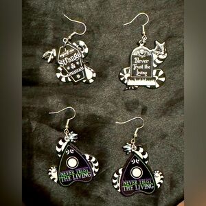 Two sets of Beetlejuice earrings